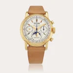 Reloj Patek Philippe Ref. 2499 Second Series con calendario perpetuo y cronógrafo, en oro amarillo y correa marrón, con venta minorista por Gobbi Milano.