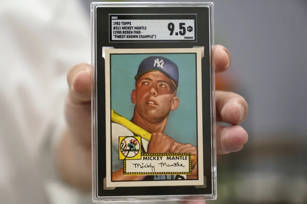 Tarjeta 1952 Topps Mickey Mantle número 311 certificada con calificación SGC 9.5, considerada uno de los ejemplares más valiosos del coleccionismo deportivo.